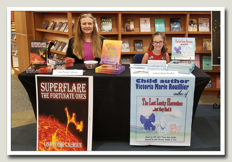 Lisa and Victoria at a book signing together.